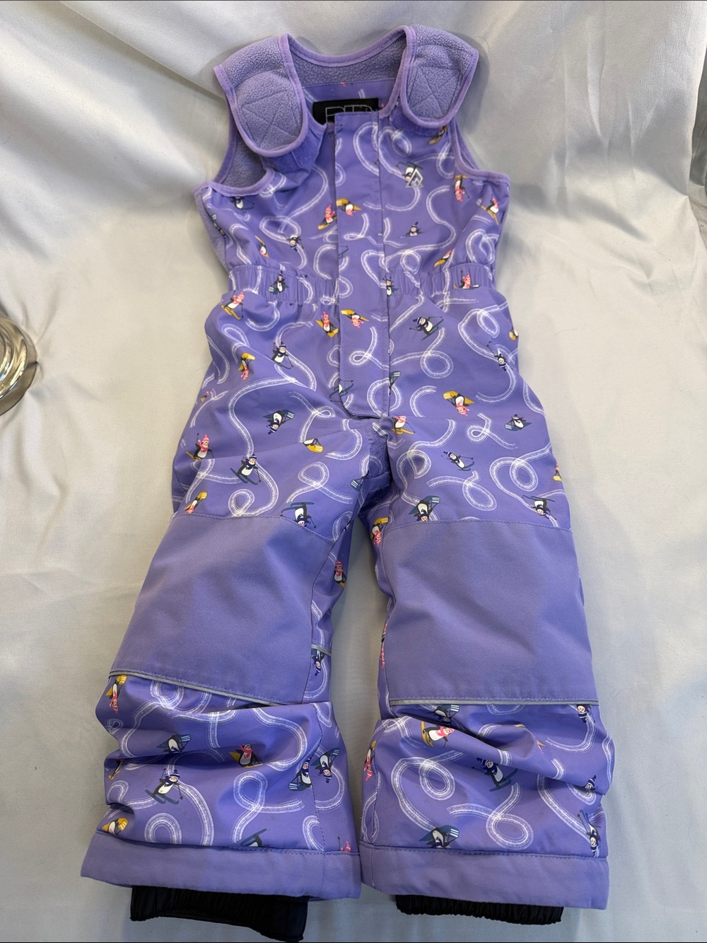 Ripzone - Purple Girls' Snow Bib Romper pants with penguin design